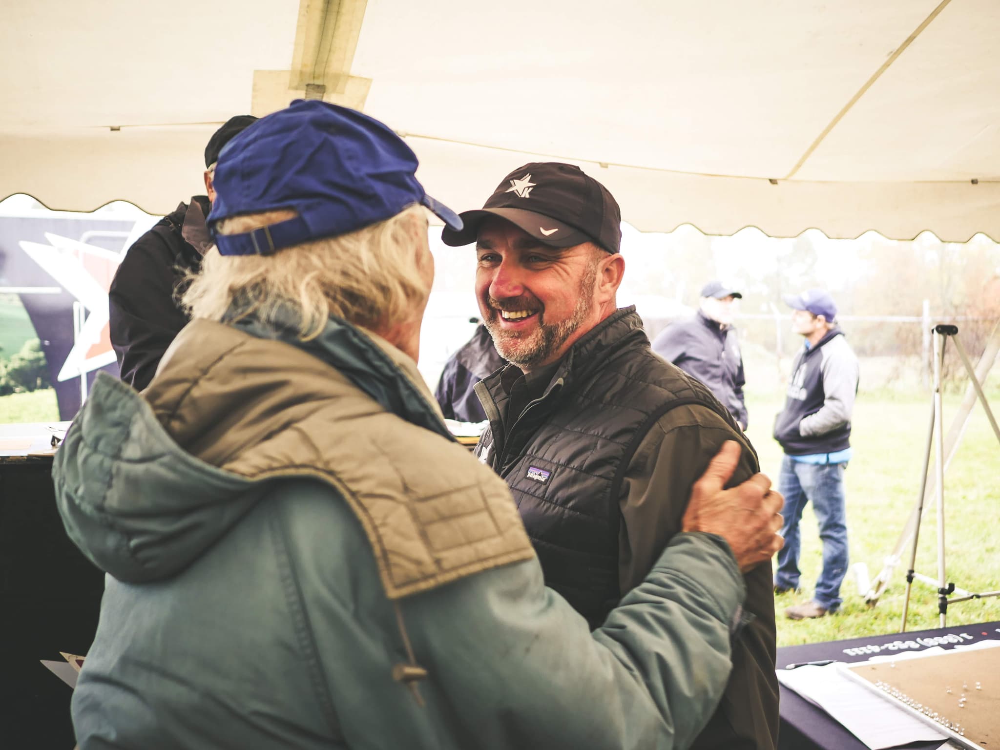 Kaufman team member greeting a client